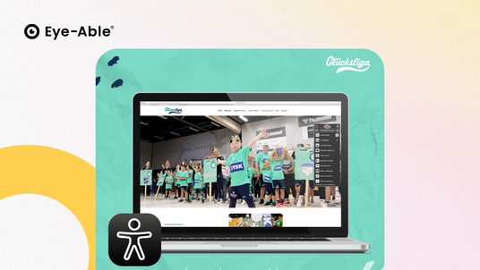 A computer screen can be seen with Eye-Able Assist opened on the Website of Glücksgefühle. In the down left corner is the stick figure symbol of accessibility and in the upper left corner the Eye-Able Logo is depictured.