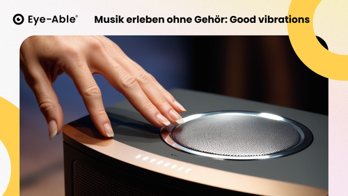 In the picture a hand can be seen touching a loudspeaker. It depicts a deaf person experiencing music.