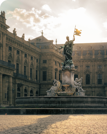 Frankoniabrunnen in Wuerzburg and the Residenz in the background
