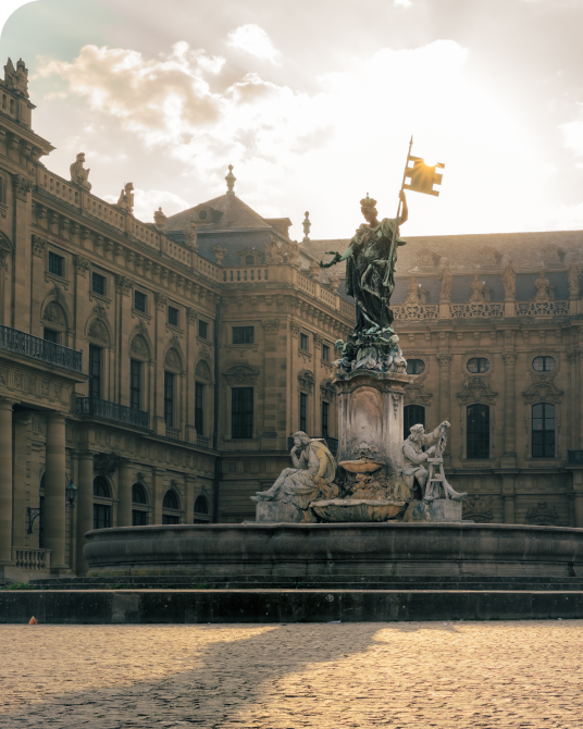 Frankoniabrunnen in Wuerzburg and the Residenz in the background