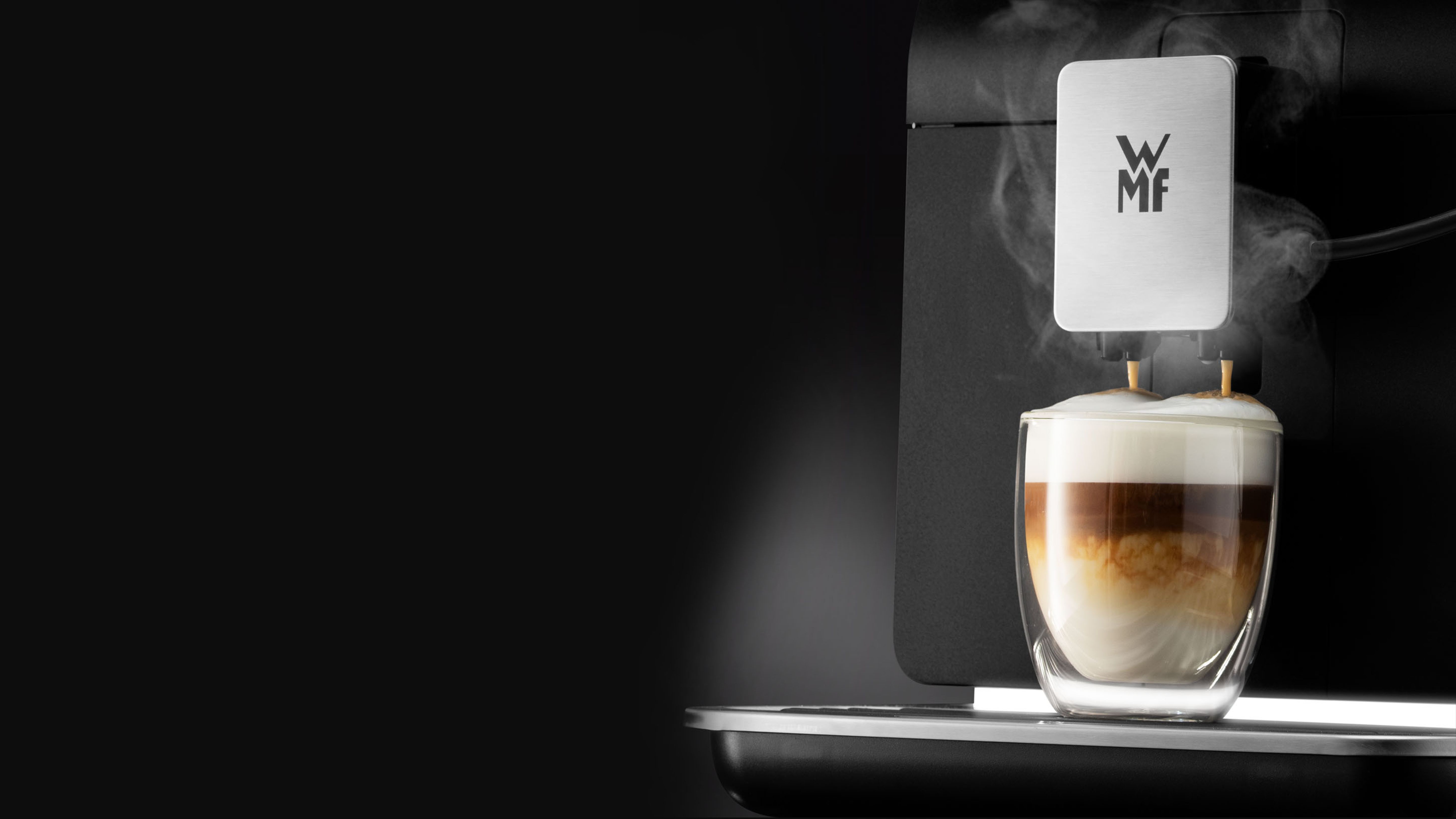 WMF Perfection OFFICE coffee machine close-up with cup of coffee