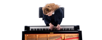 Tamta Magradze playing piano, photographed from above