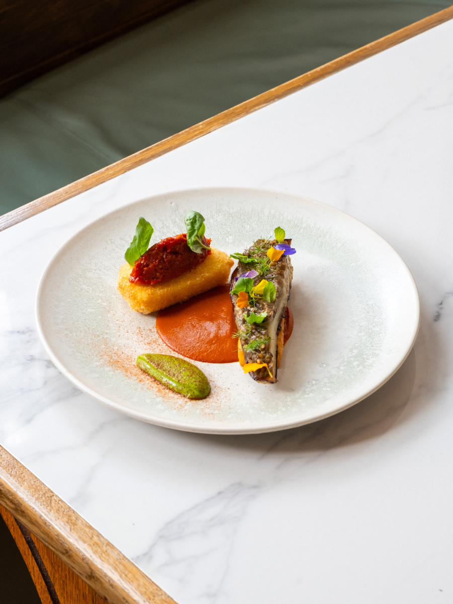 Roasted aubergine with smoked tomatoes, farinata and mozzarella in carrozza
