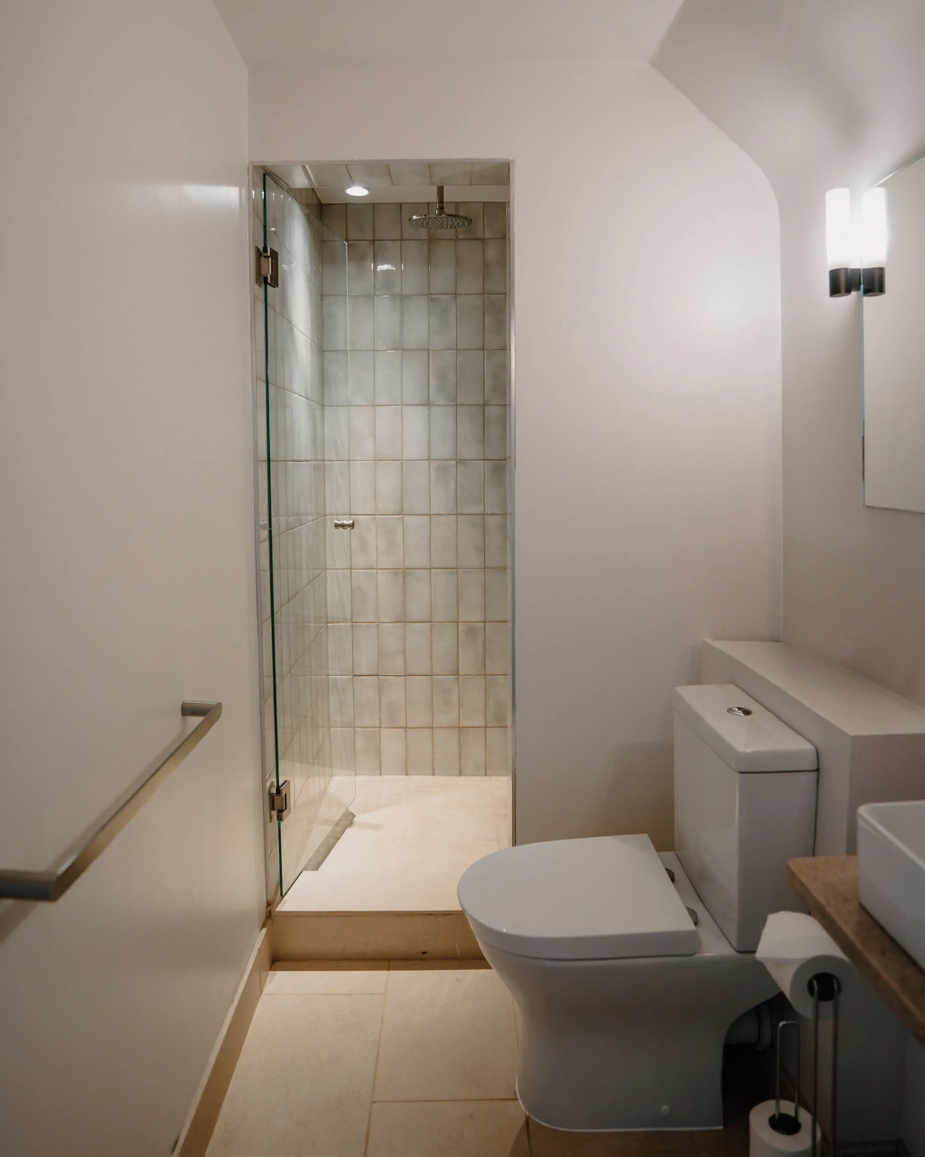 Tiled walk-in shower with a glass screen and WC at ARC Painswick
