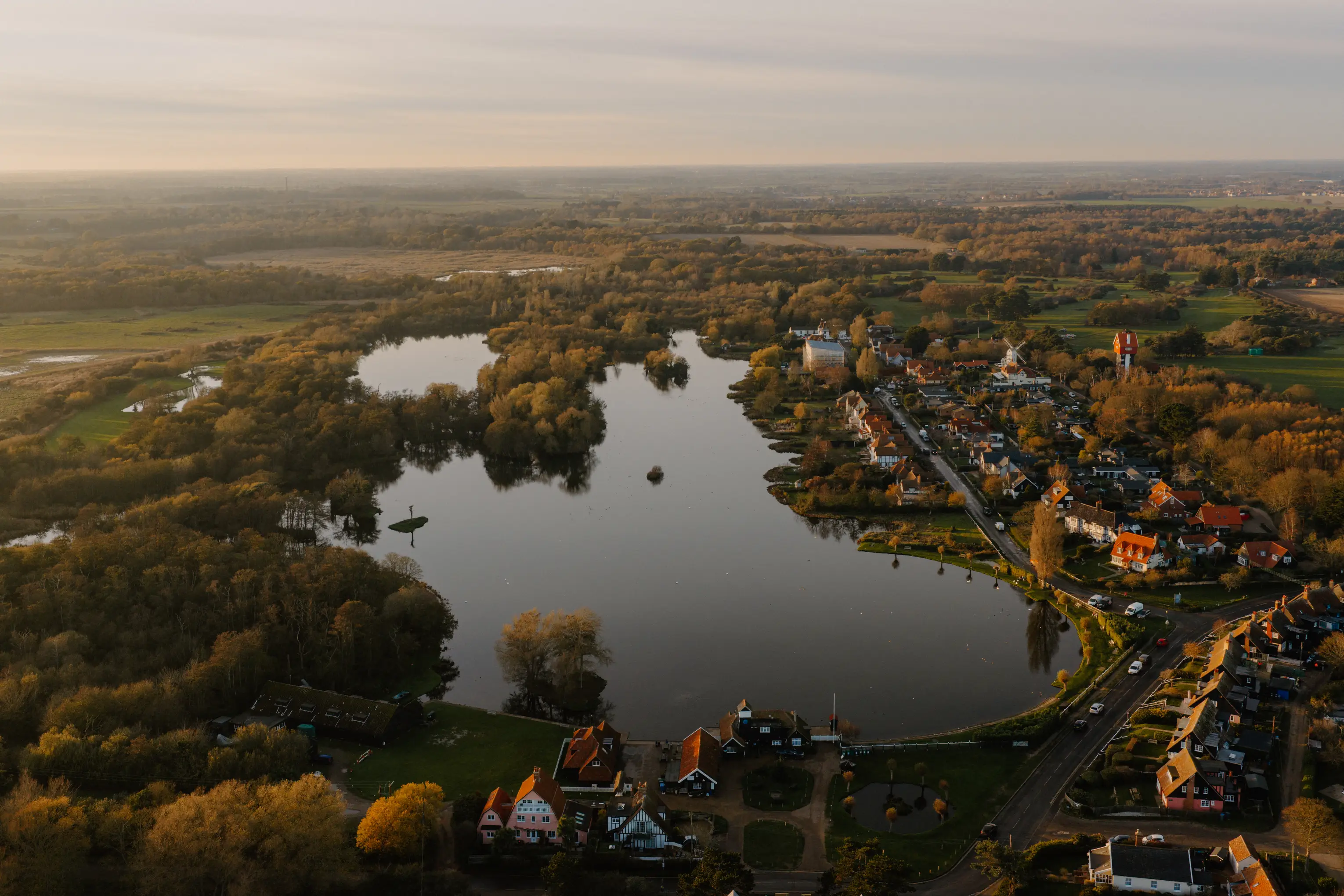 Aerial view over the Thorpeness Meare and village at dusk