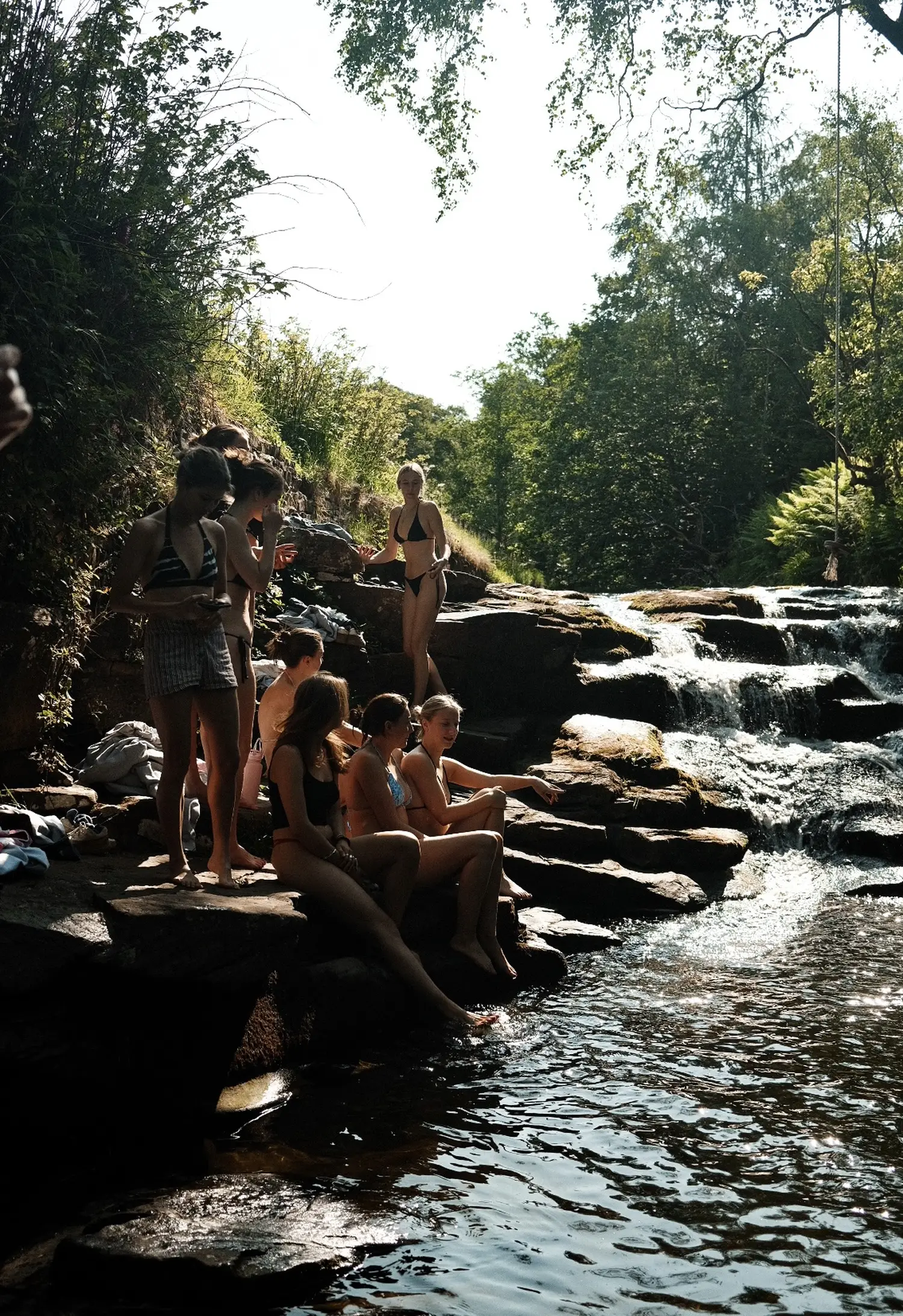 Guests at ARC Peaks gather for a custom excursion, away from their group accommodation at the Peak District, for cold water swimming and a guided hike.