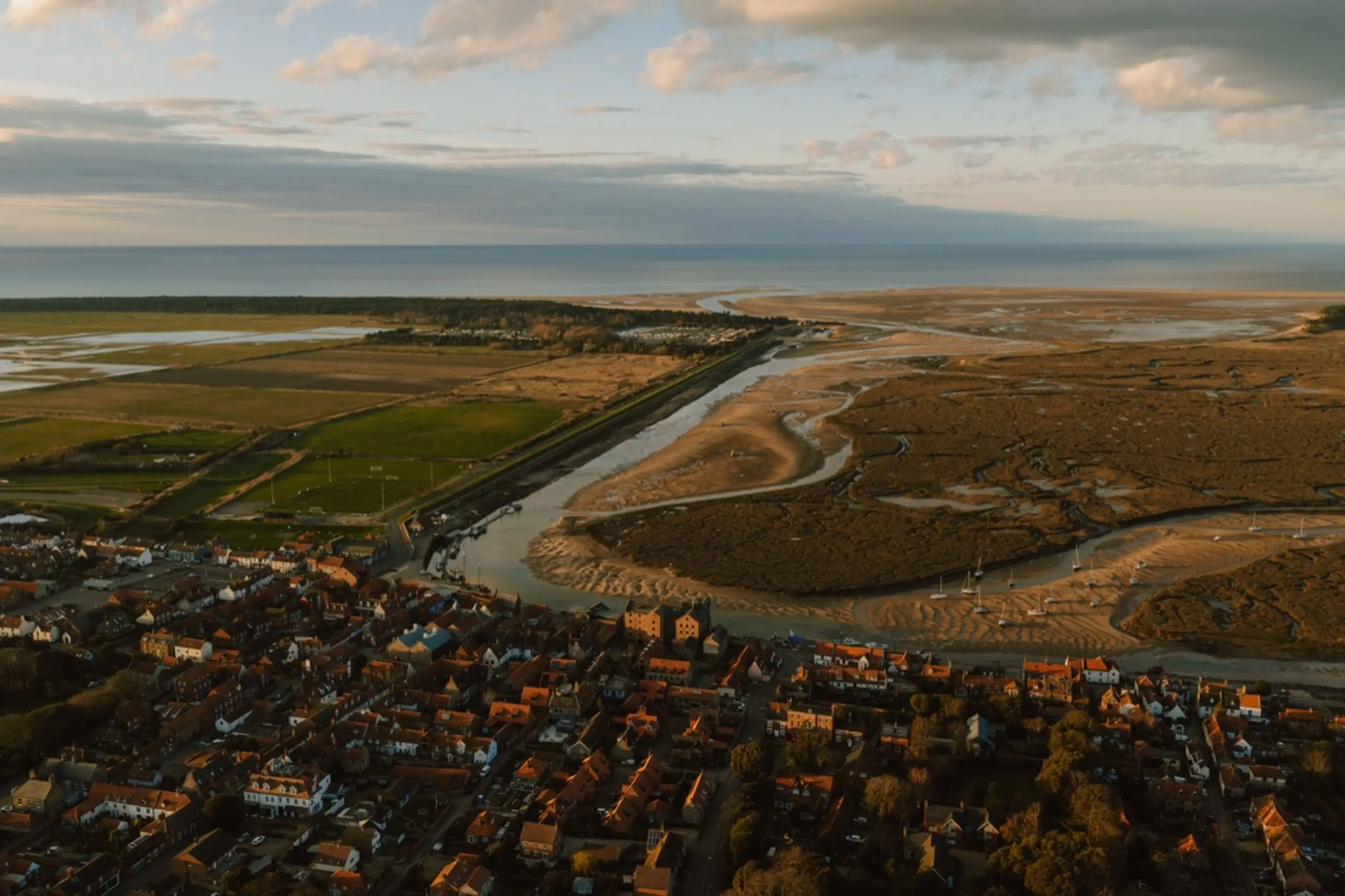 Aerial view over the North Norfolk salt marshes and tidal channels at Wells-next-the-Sea