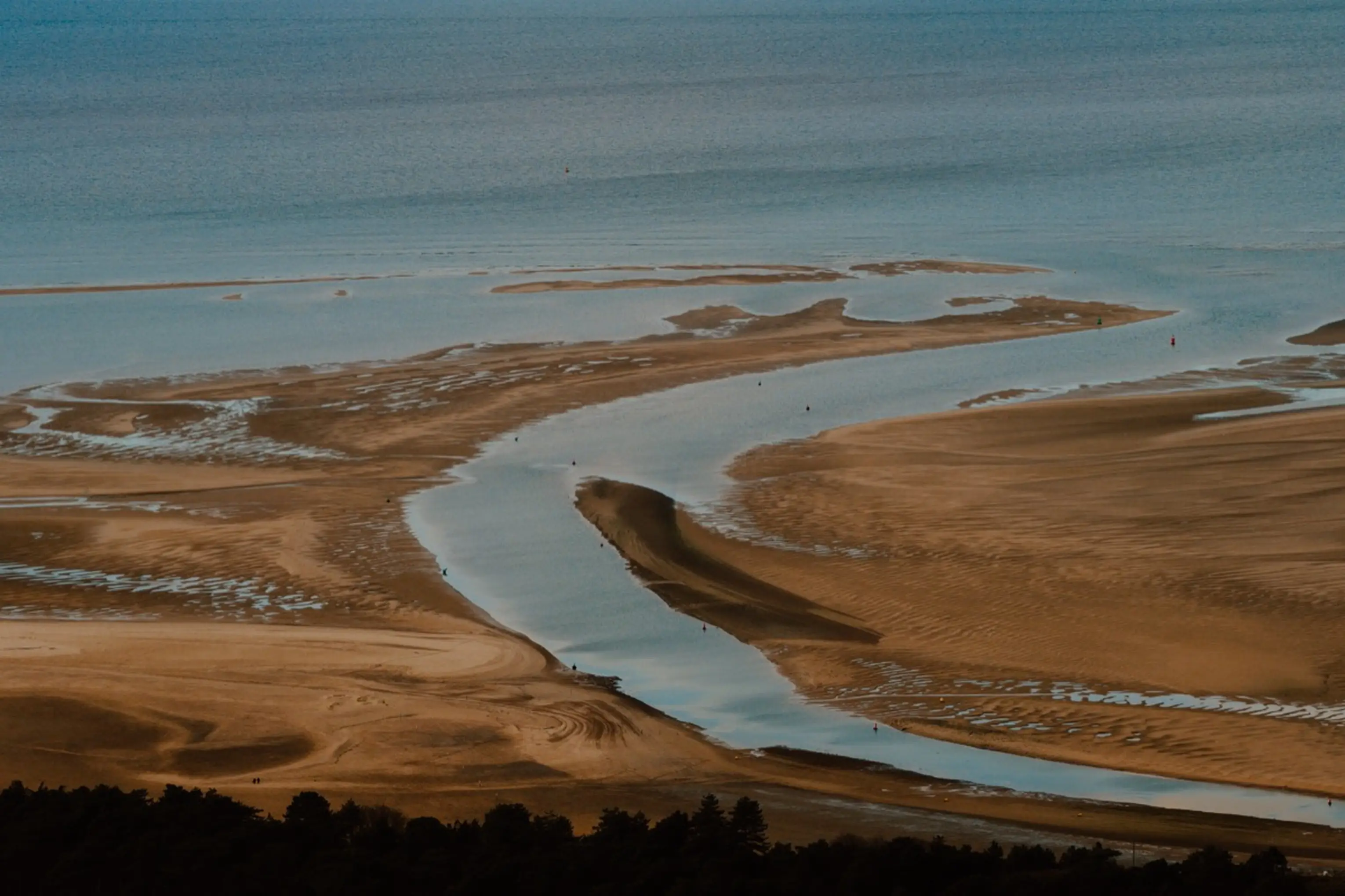 Aerial view over the sandy beach and tidal channels at Wells-next-the-Sea