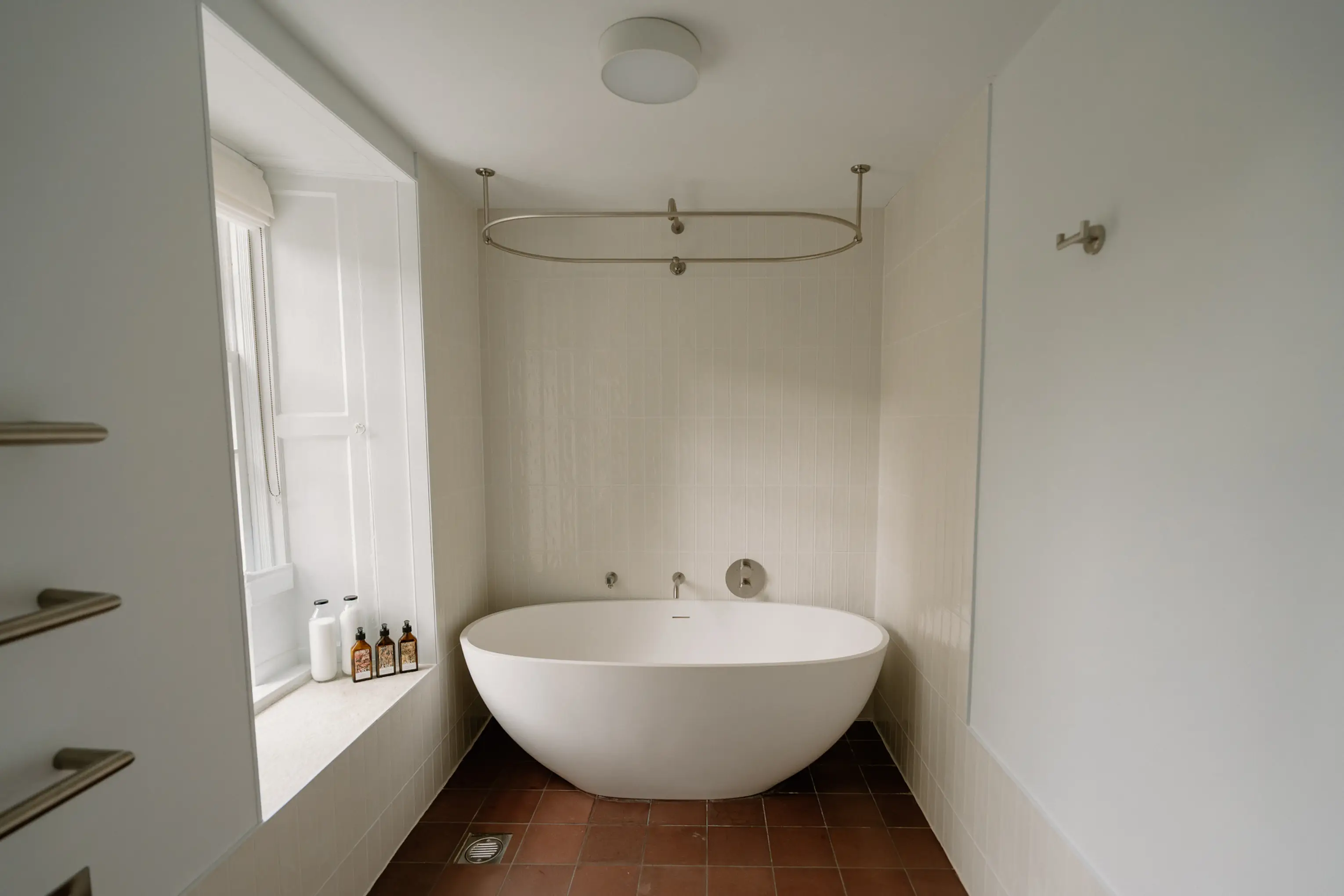 Ensuite bathroom at ARC Painswick with free-standing bath