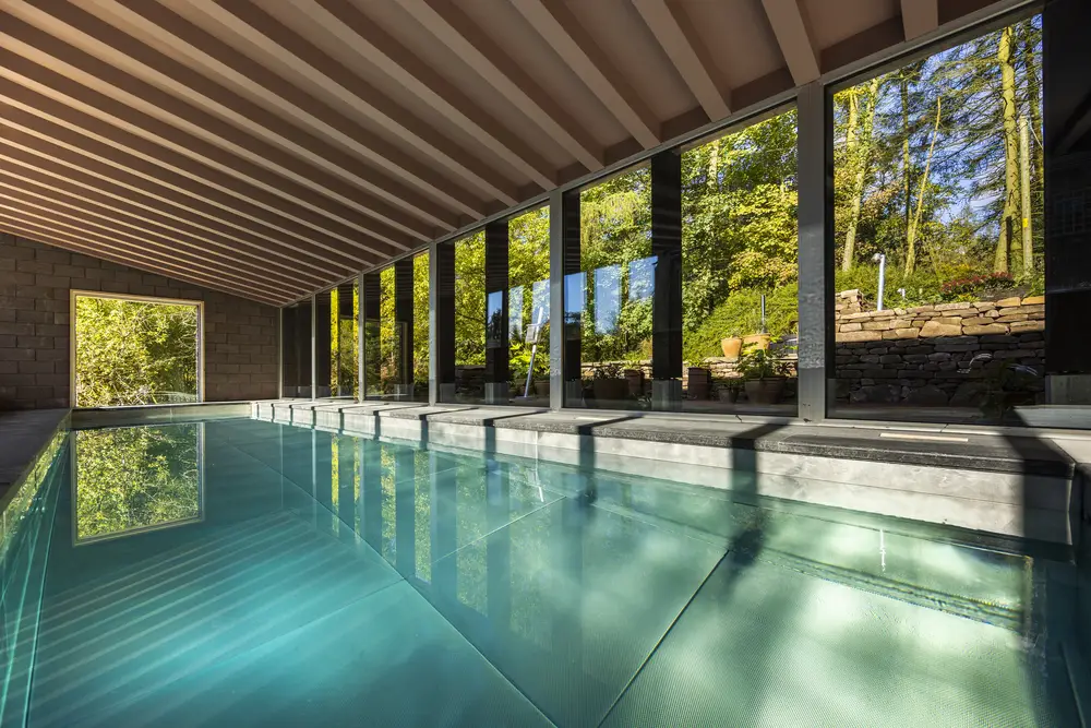 A shot of this group accommodation with an indoor swimming pool, looking out across the Peak District nature.