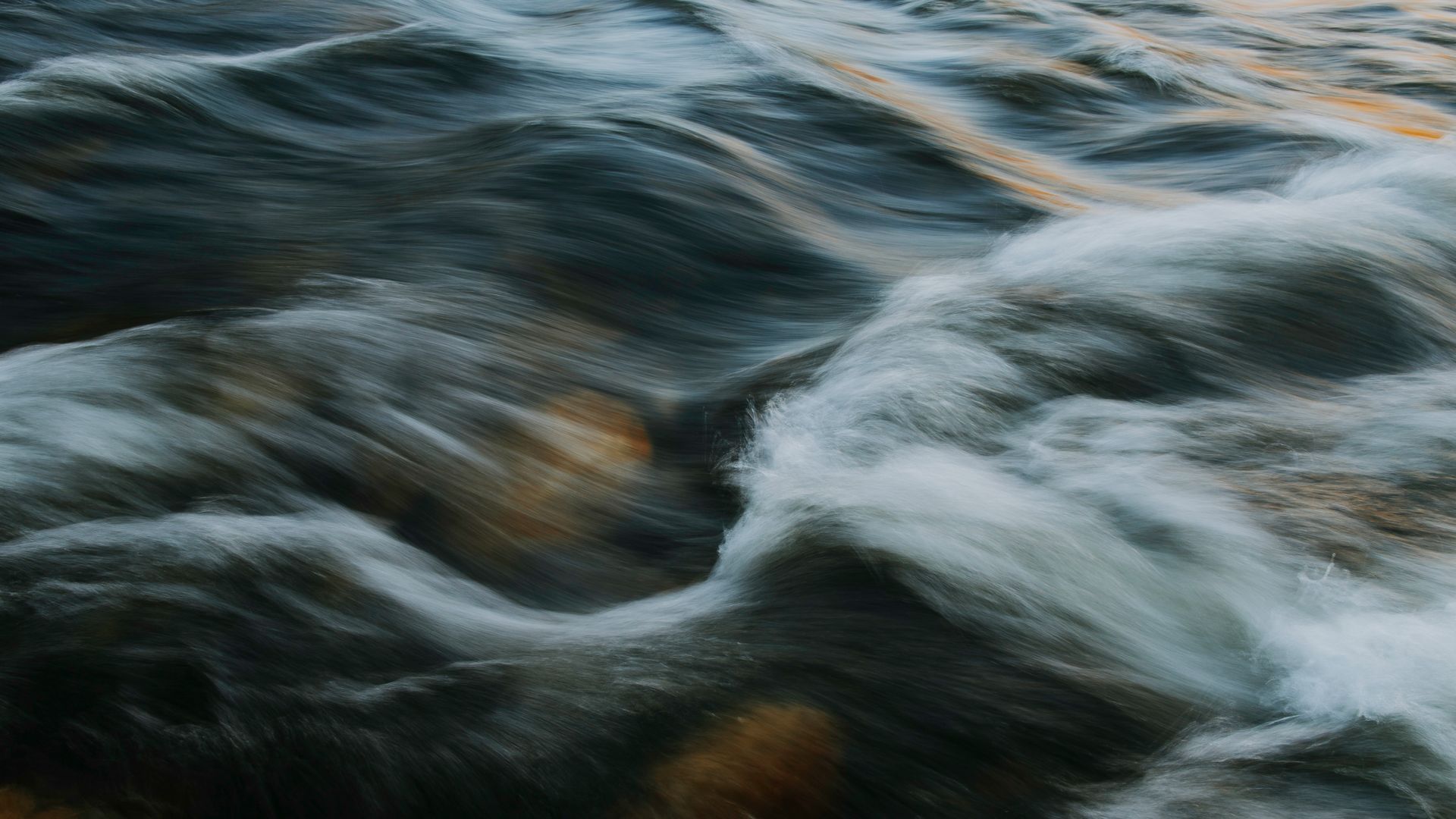 A calm ocean with blue waves