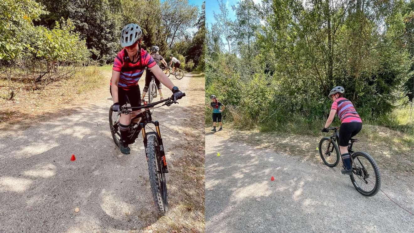 Radfahrerin fährt um Hütchen beim Fahrtechniktraining