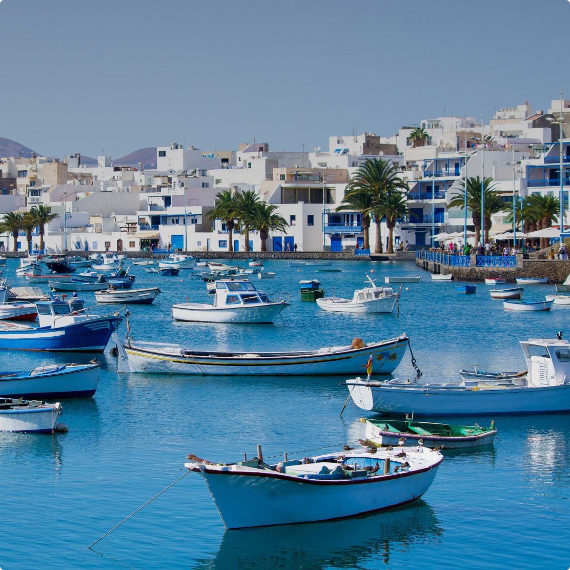 Boats floating on harbour in Lanzarote