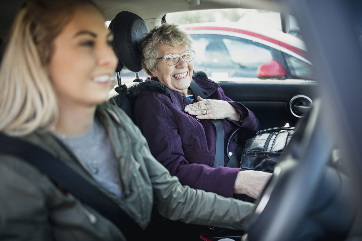 Two women sat in car