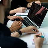 Person typing on laptop