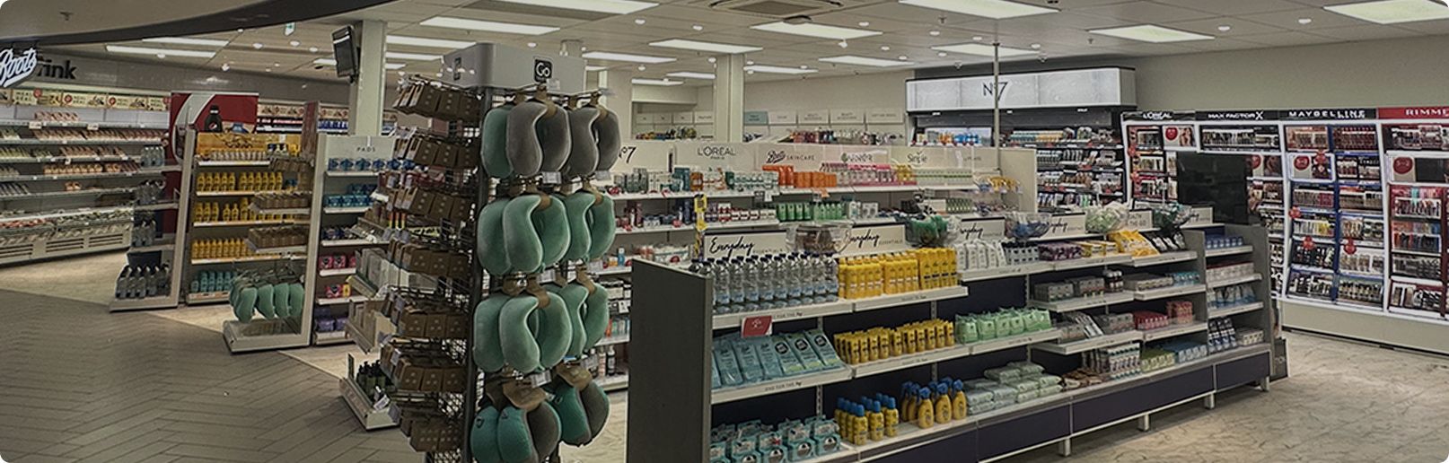 Inside a Boots store with products stacked on shelves