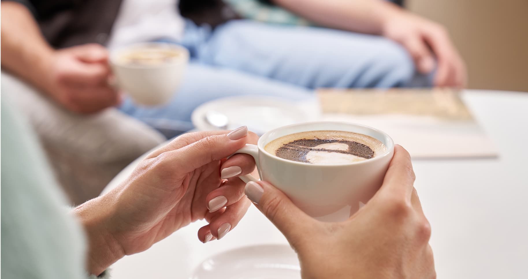 Woman holding coffee