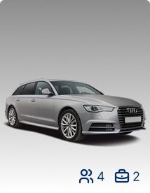 Silver car that holds 4 passengers and 2 suitcases