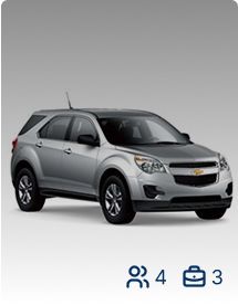 Silver 4x4 car that holds 4 passengers and 3 suitcases