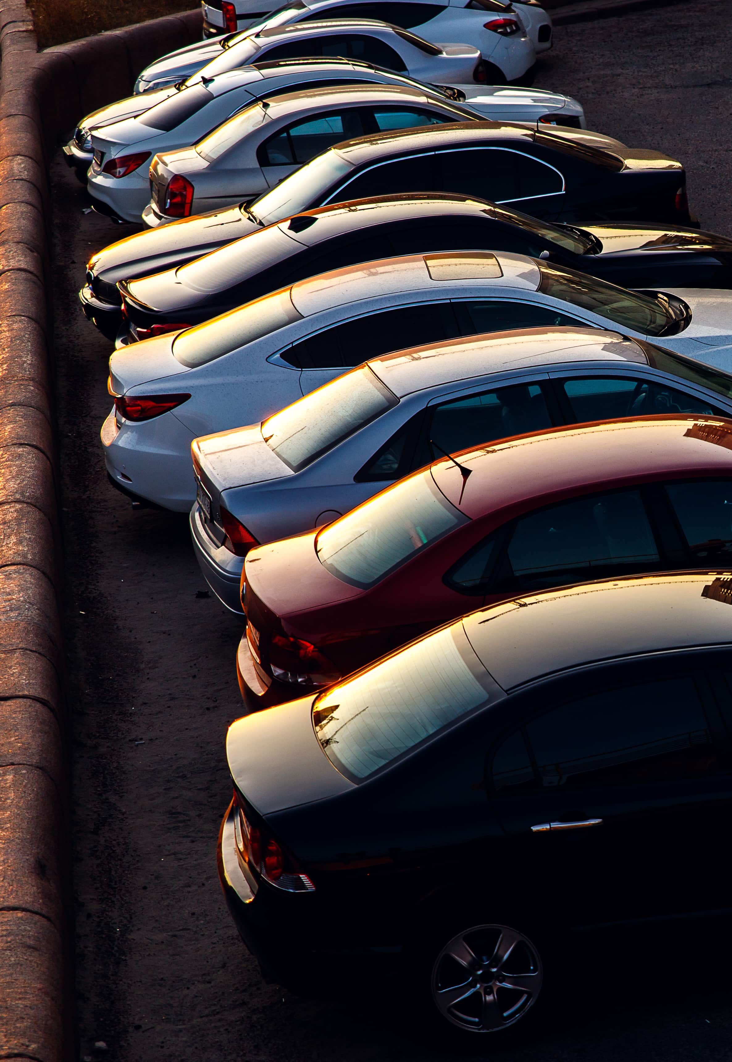 Cars lined up in car park