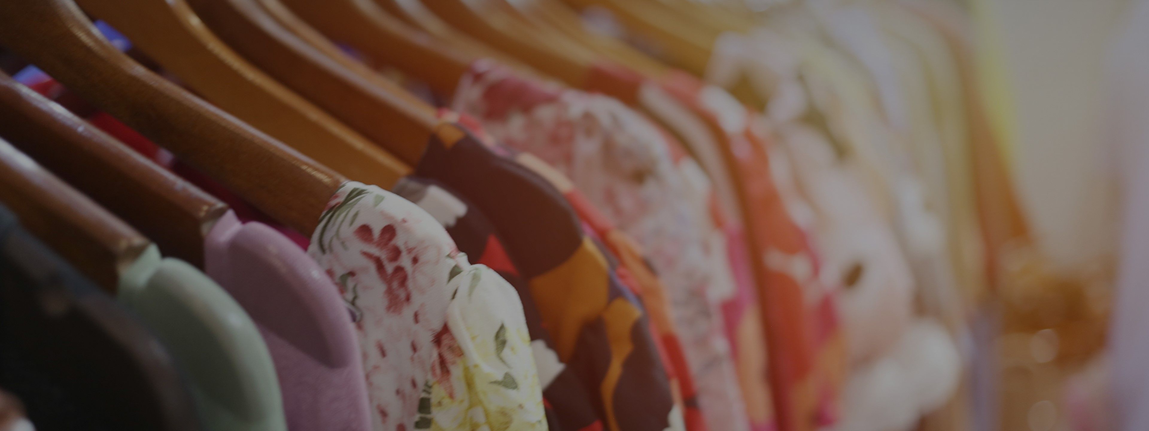 Colourful clothes on rail