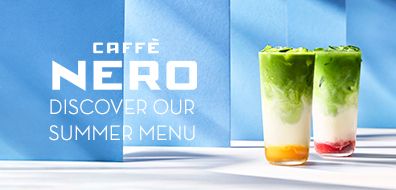 Two layered iced drinks with bright colors, next to the text "Caffè Nero Discover Our Summer Menu" on a blue background.