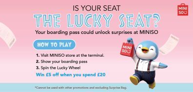 Penguin mascot with boarding passes, promoting MINISO's "Lucky Seat" offer. Steps to play mentioned for a chance to win £5 off when spending £20.