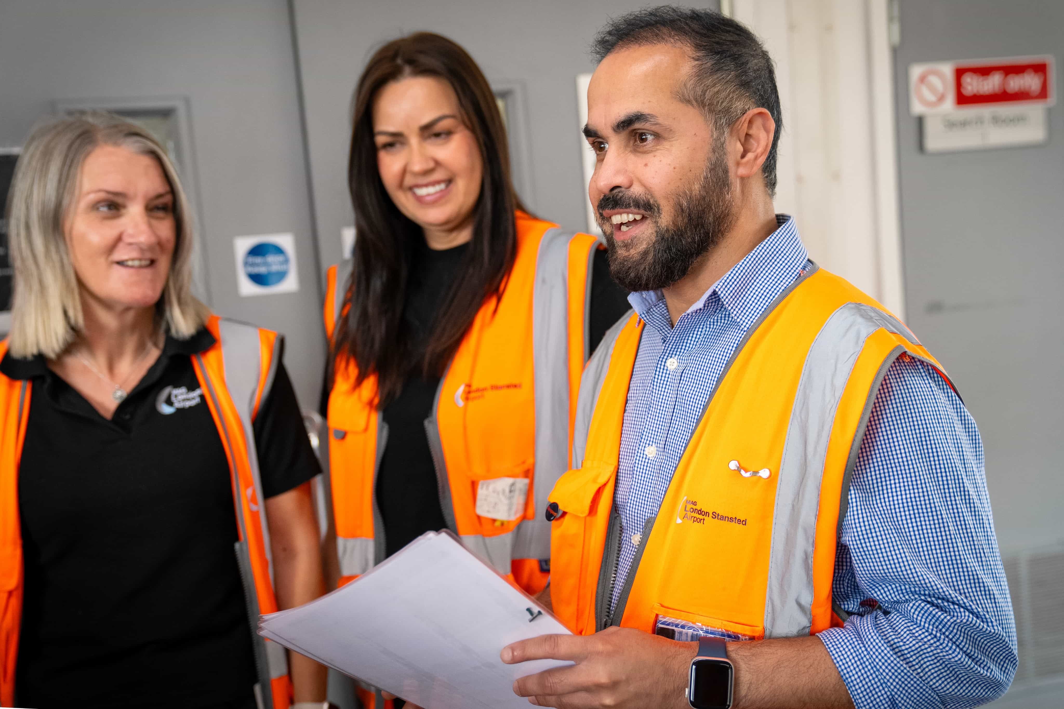 People in orange high vis jackets