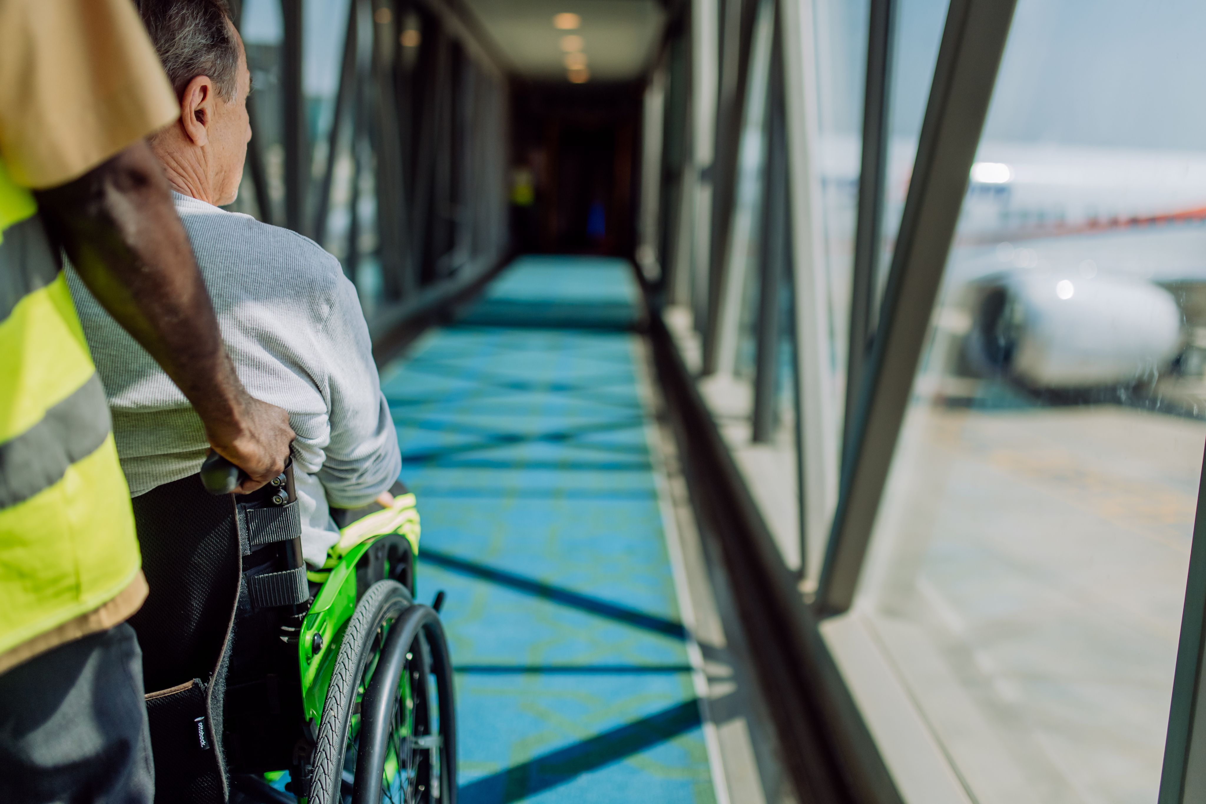 person being assisted when boarding plane
