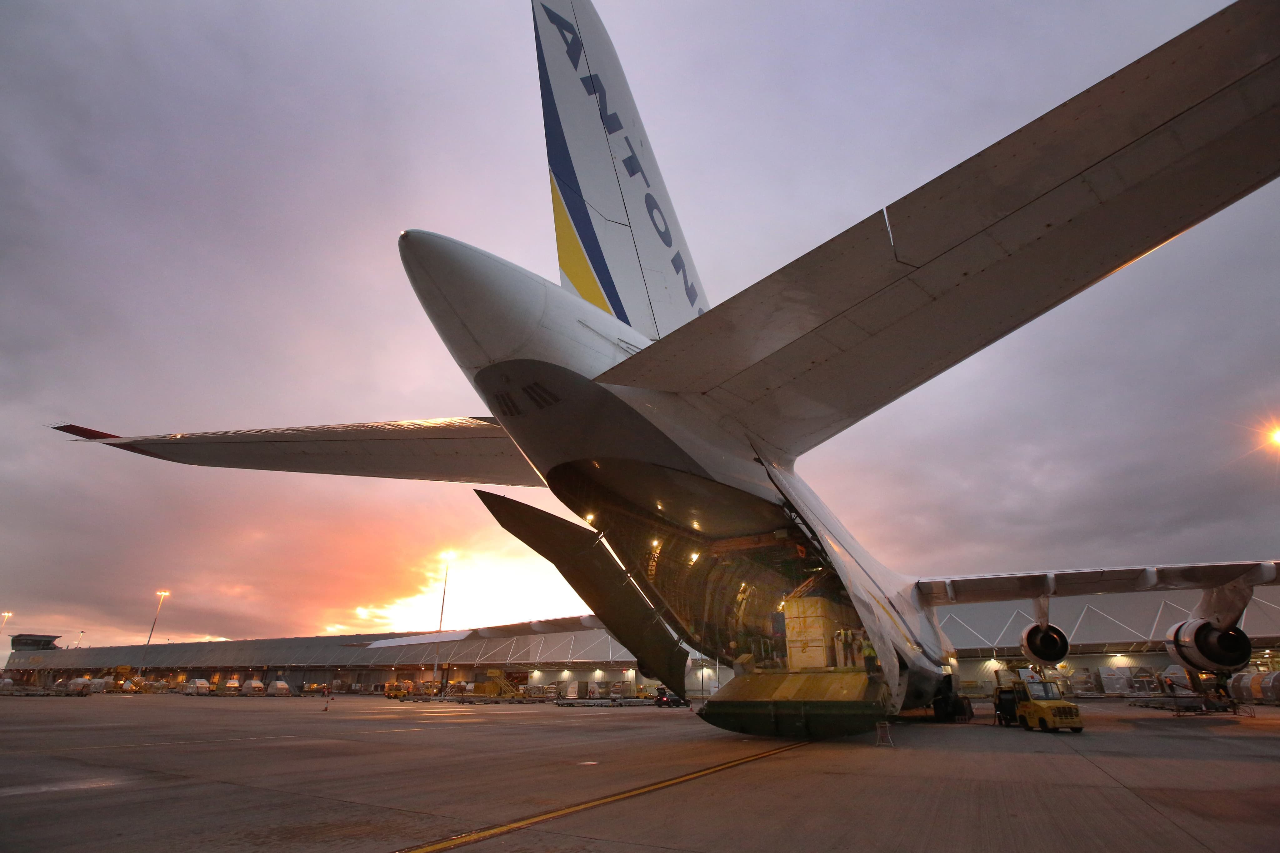 Cargo being loaded into bottom of plane