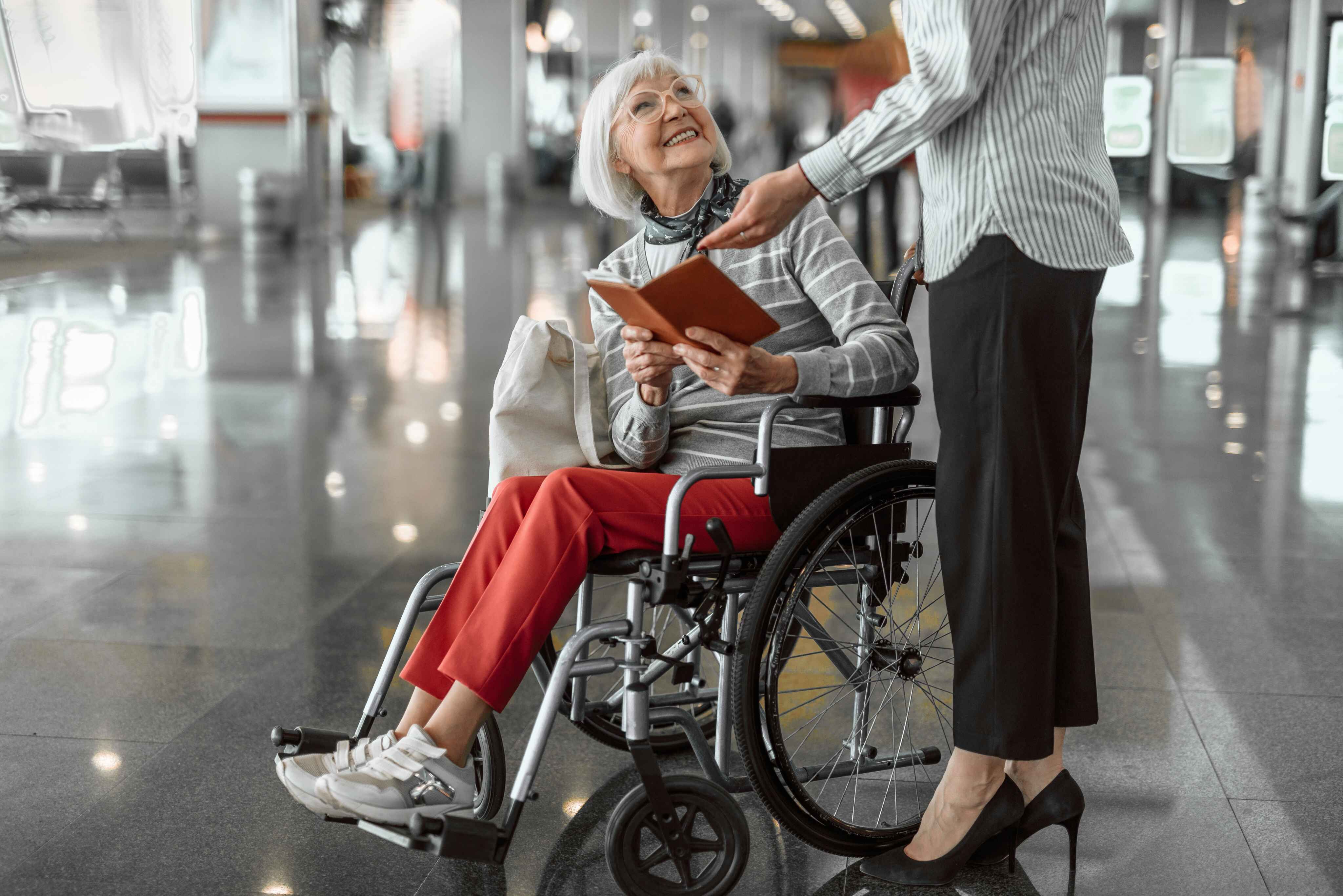 person in wheelchair in airport