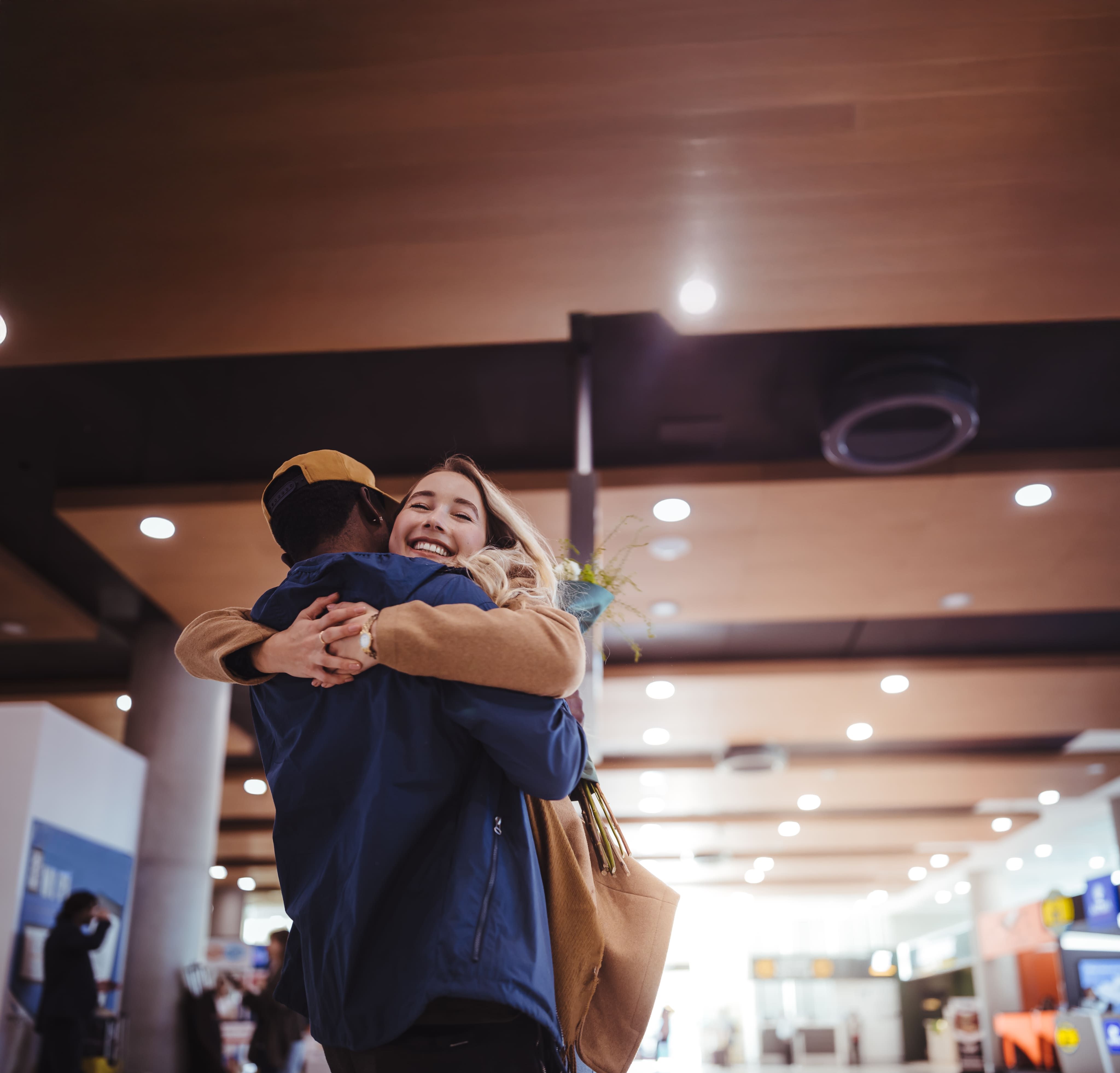 Woman hugging man
