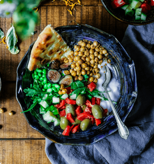 Image of a mezze bowl on a wooden table