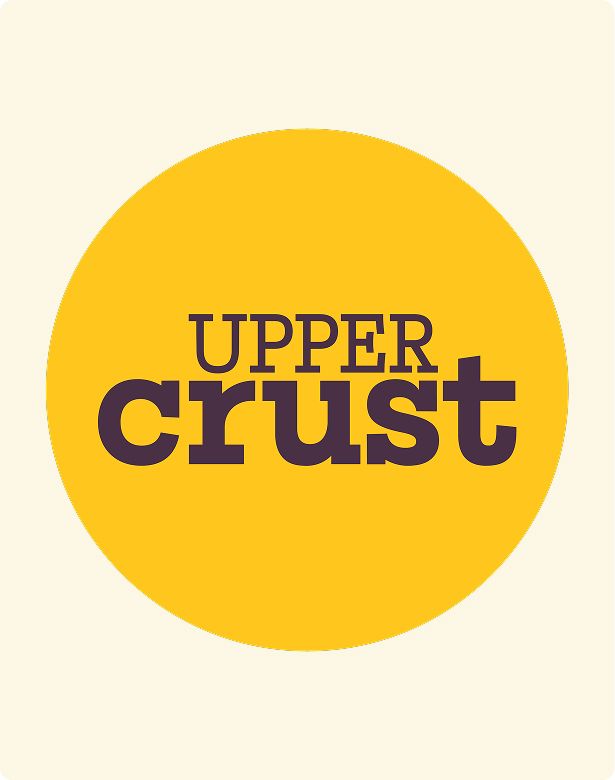Logo with a yellow circle background featuring the text "UPPER crust" in bold, dark font, centered within the circle.