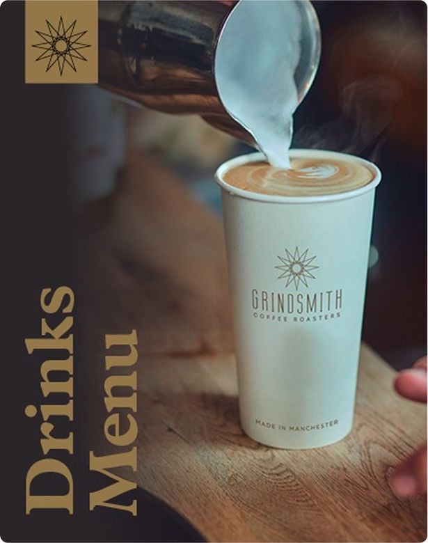 A steamy latte being poured into a branded "Grindsmith Coffee Roasters" cup, next to a menu with "Drinks Menu" in bold text.