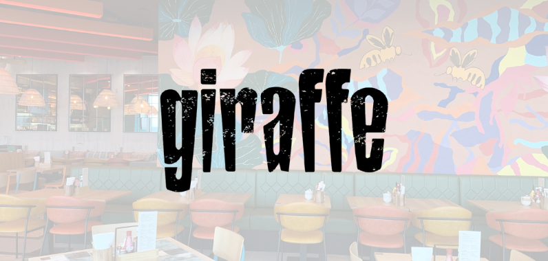 Restaurant interior with colourful mural and neon lights, featuring the word "giraffe" in large, bold black letters across the image.
