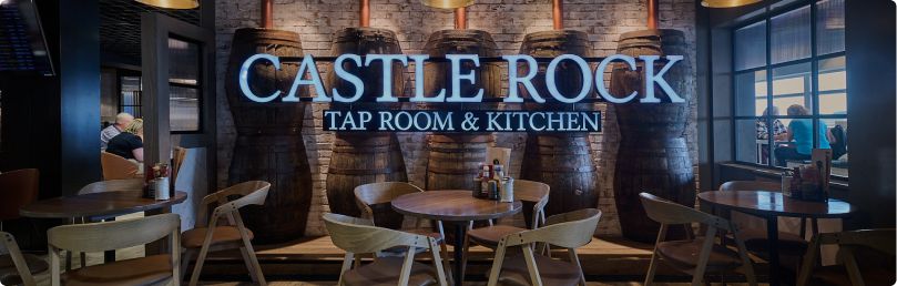Seating area and sign in Castle Rock